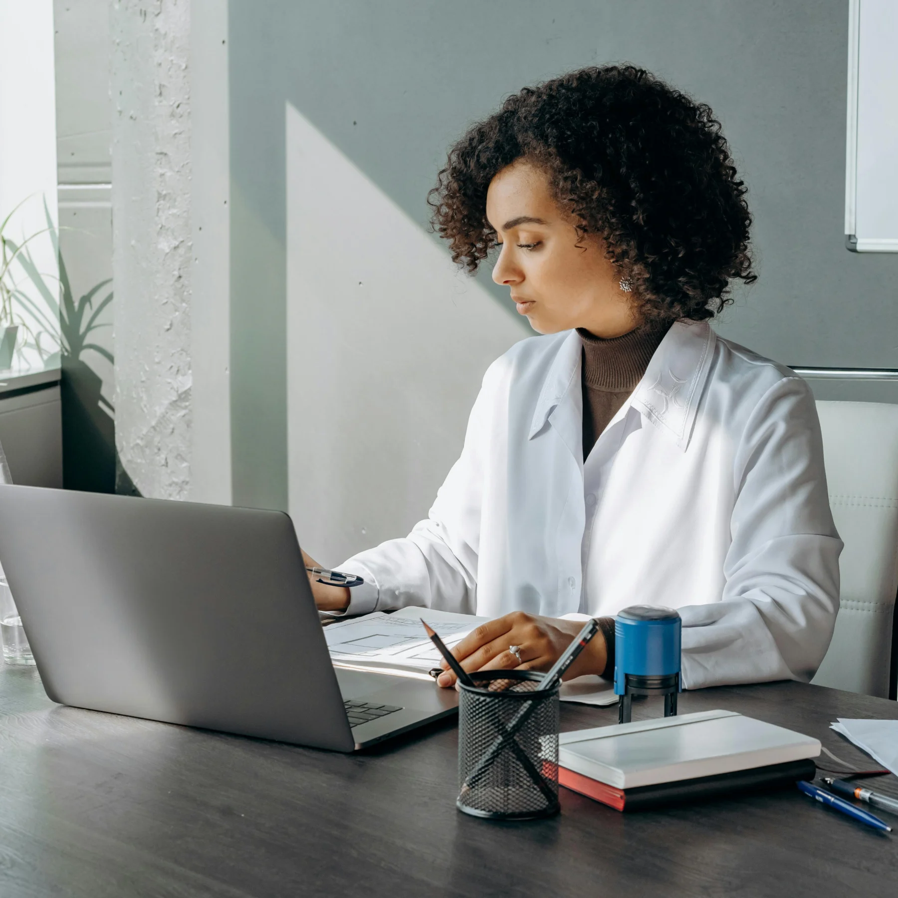 Professional working on laptop